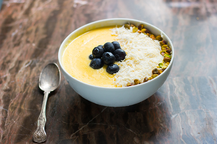 This mango pina colda smoothie bowl recipe is the perfect way to start the day off right. It is like having a eternal summer.