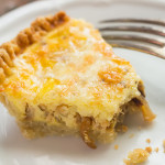 This caramelized onion cheddar tart is both sweet and salty, flaky and creamy, buttery and hearty. Easy to make ahead, so do it!