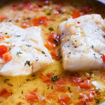 This steamed cod with tomato thyme sauce is the perfect dish year round.the cod is slow cooked it allows the fish to be flaky and buttery every time.