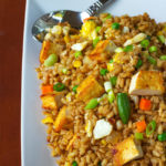 I love when I can take a twist on a popular dish. This super easy tofu barley fried rice is a flavorful, filling and can be prepared in 20 minutes. That's faster than take out, not to mention more nutritious.