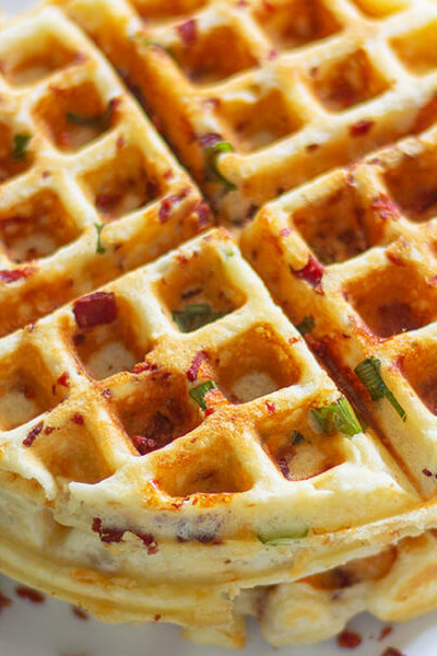 These easy bacon cheese waffle is super crisp on the outside and light on inside. Adding cheese, bacon and scallions makes this recipe perfect anytime.