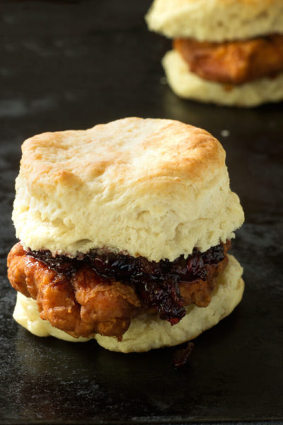 Over the top buttermilk chicken biscuit with blackberry habanero sauce is crispy, flaky a little sweet, spicy and a lot of delicious.