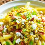 I love Mexican street corn so this what the next step for me, I basically married two of my favorite things- Mexican street corn and Pasta. This roasted corn and tomato pasta is cheesy, creamy, and loaded with flavor.
