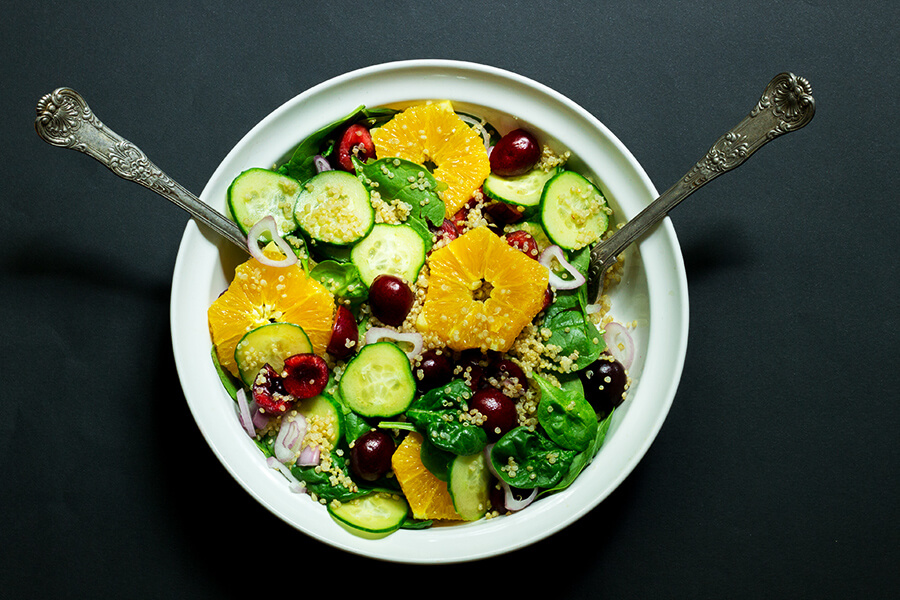 This salad is quick and easy, it requires little cooking. Cherry, orange, quinoa, spinach and cucumber covered in a lemon poppy seed dressing is perfection. 