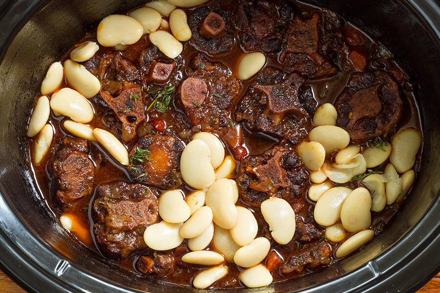 This slow cooker oxtail and butter bean recipe has everything you could ever want in a beef stew. It is hearty and super satisfying and not to mention easy.