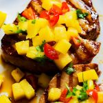 This grilled tuna steaks with pineapple salsa packs the perfect punch of savory, sweet and spicy. Make it today.