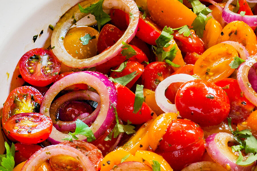 Super easy Balsamic Tomato & Onion Salad recipe that has everything. Sweet and crisp vegetables that are tossed and soaked in a tangy vinaigrette.