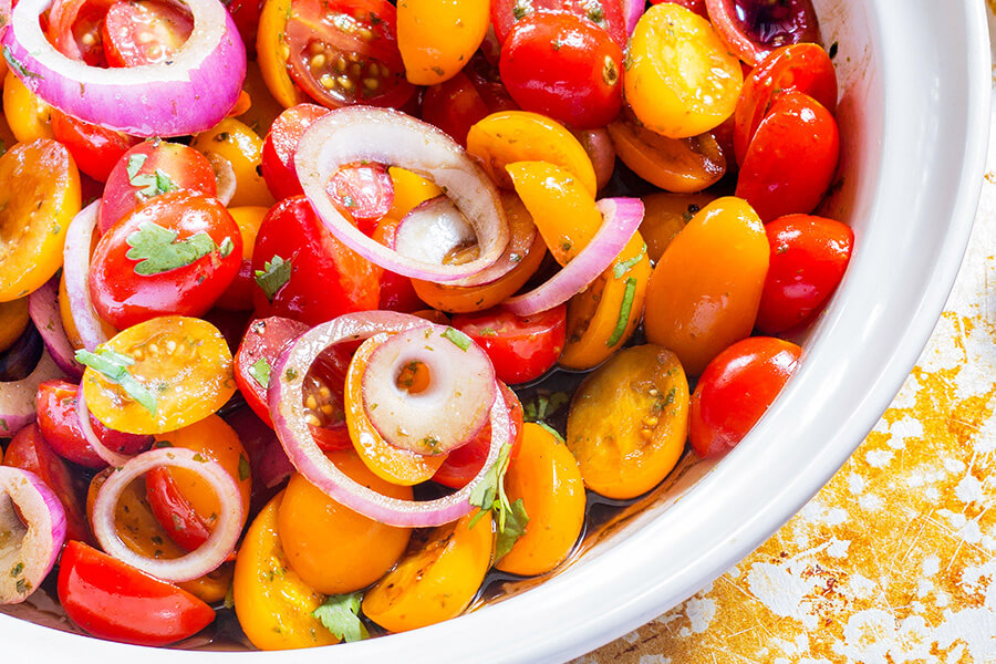 Super easy Balsamic Tomato and Onion Salad recipe that has everything. Sweet and crisp vegetables that are tossed and soaked in a tangy vinaigrette.