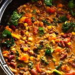 This Slow- Cooker Jerk Turkey Chili recipe is the perfect weeknight dinner. It has the right amount of spice to add some excite everyone. make it today.