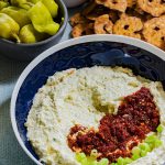 This Whipped Greek Feta Dip recipe is tang, a tad spicy and incredibly cream. It packs a punch to any chip or sandwich. Make it today.