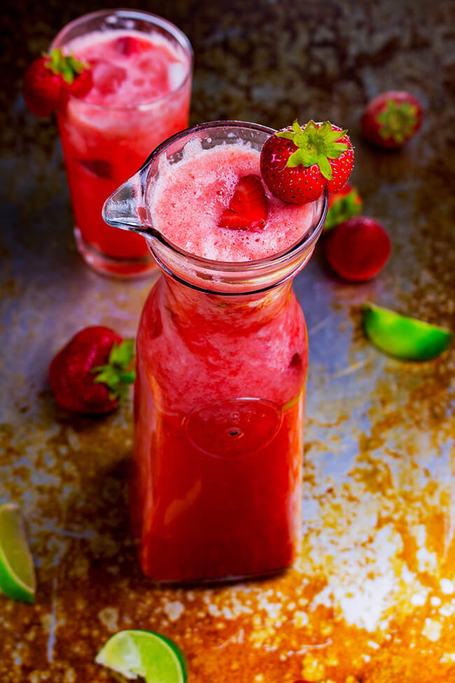 This strawberry coconut limeade recipe is the perfect drink for warm summer days. Make this delightfully refreshing drink today.