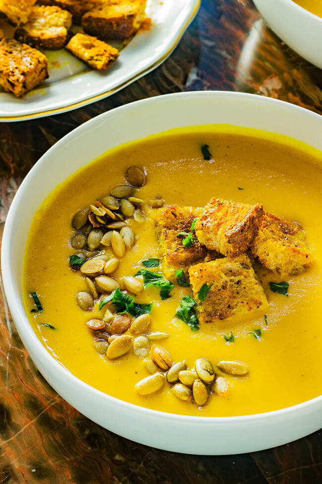 Creamy Curry Butternut Squash Soup is a savory, warming, comforting and simple soup that's the perfect recipe for the fall and winter. 